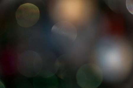 Defocused Christmas tree lights, colorful bokeh background.の写真素材