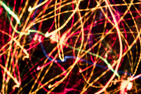 Colorful lights blurred in motion as abstract background.