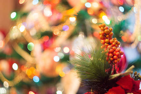 Holiday background with decorations on Christmas tree.の写真素材