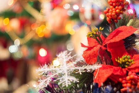 Holiday background with decorations on Christmas tree.の写真素材