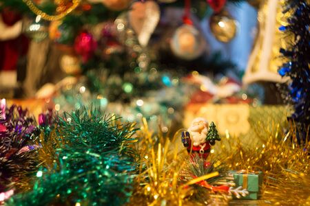 Holiday background with decorations on Christmas tree.の写真素材