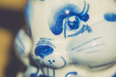 Macro photo of cute ceramic hare, rabbit in blue and white colors.の写真素材
