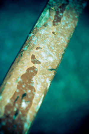 Macro photo of fresh snowflakes on wooden railing, winter background.