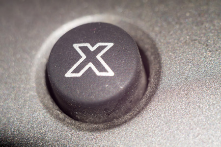 Close up of black computer keyboard button, grunge background.の写真素材