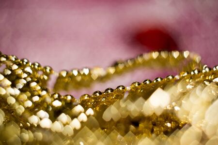 Colorful blurred background of pink and gold color, bokeh effects.の写真素材