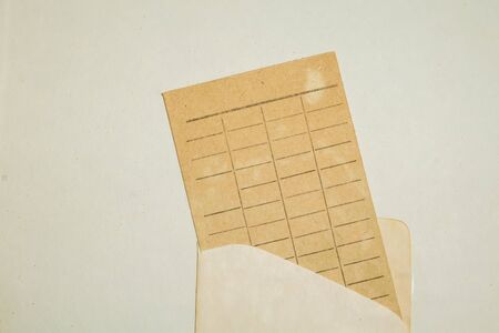 Vintage due date card, grunge paper texture.の写真素材