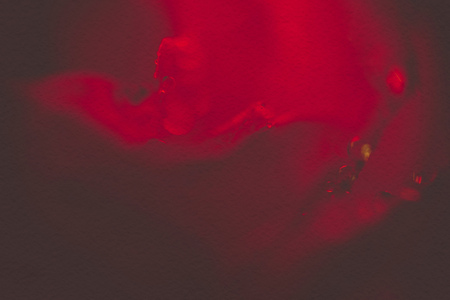 Extremely close up of red rose in water drops, shallow focus, vintage effect with paper texture.の写真素材