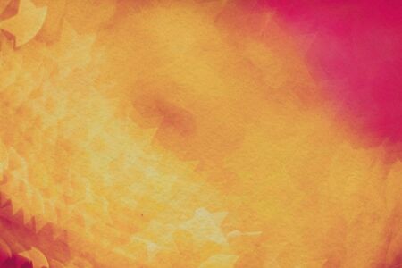 Colorful blurred background of pink and gold color, bokeh effects, textured with paper.の写真素材