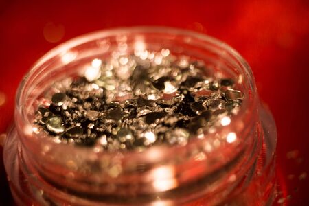 Silver pastes for nails decoration, close up background.の写真素材