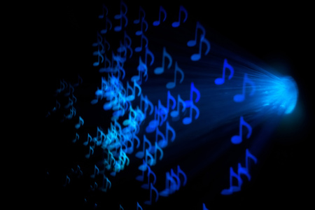 Defocused background with colorful bokeh in a shape of a music notes.の写真素材