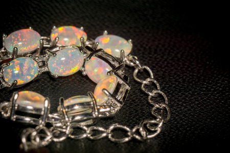 Fashion silver bracelet with white fire opals.の写真素材