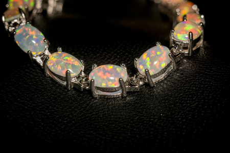 Fashion silver bracelet with white fire opals.の写真素材