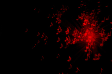 Defocused background with colorful bokeh in a shape of a music notes.の写真素材