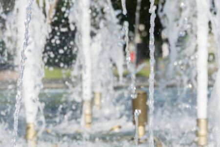 Classic fountain in city park close up photo.の写真素材