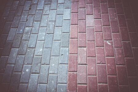 Abstract background of an old park road made of bricks.の写真素材