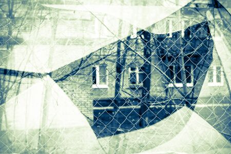 Sharp glass hole cracks splinters, broken glass by the street, retro colors.の写真素材