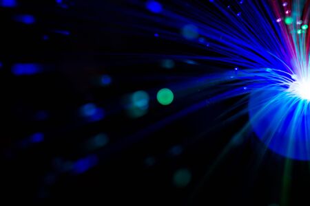 Bright colorful bokeh lights effect, defocused background.の写真素材