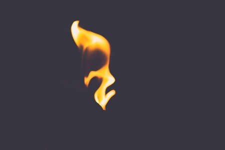 Soft focus of fire flames texture on a dark backgroundの写真素材