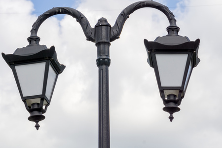 Vintage street lamp in the city park at sunny day.の写真素材