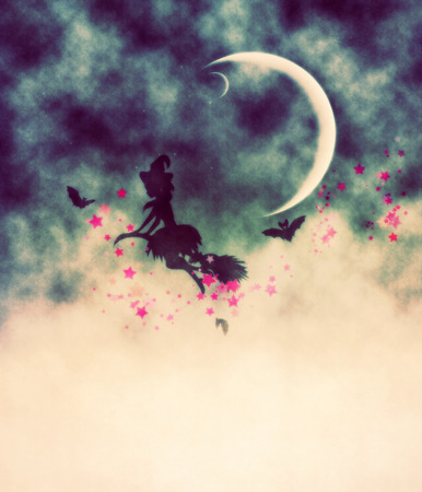 Flying halloween witch silhouette and crescent moon, night foggy background.の写真素材
