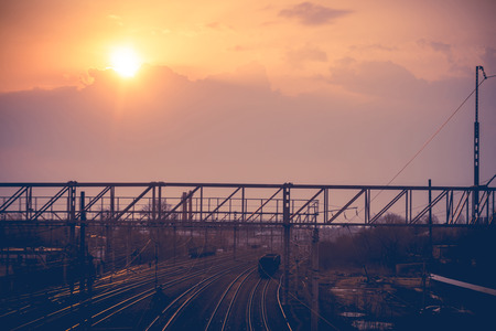 Hazy morning and rising sun with clouds.の写真素材