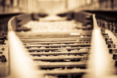 Grunge old railroad tracks close up background.の写真素材