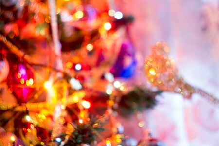 Festive background with bokeh from Christmas tree lights glowing.の写真素材