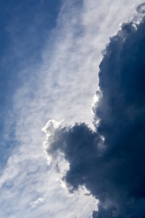 Dramatic stormy black sky clouds before rain, natural background.の写真素材