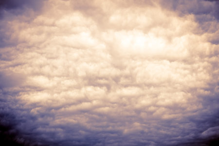 Dramatic stormy black sky clouds before rain, filtered background.