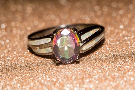 Fashion ring with mystic topaz, rainbow topaz, modern jewelry.の写真素材
