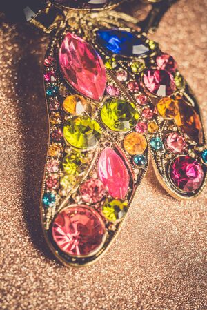 Brooch in a shape of a dragonfly decorated with multicolored rhinestones, fashion jewellery.の写真素材