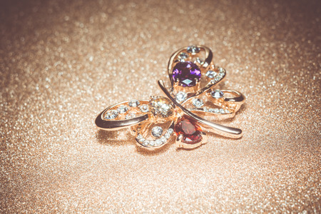 Brooch in a shape of a butterfly decorated with colorful rhinestones, fashion jewellery.の写真素材
