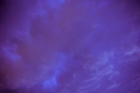 Dramatic stormy black sky clouds before rain, filtered natural background.