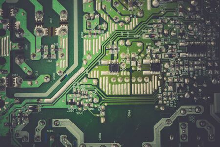 Green electric circuit board, close up background.の写真素材