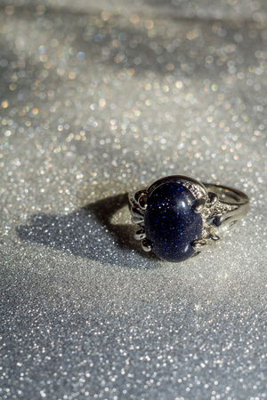 Fashion silver ring with blue sandstone, aventurine.の写真素材