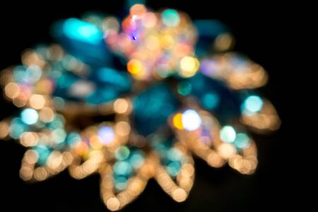 Decorative fashion flower shaped brooch with blue stones.の写真素材