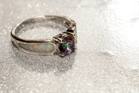 Fashion ring with mystic topaz, rainbow topaz, modern jewelry.の写真素材