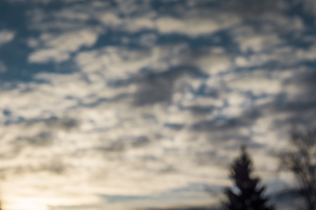 Blue sky with soft dark clouds, natural background.の写真素材
