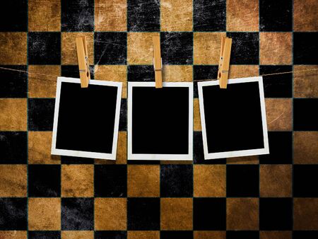 Illustration of vintage photo cards over grunge checkered background.の写真素材