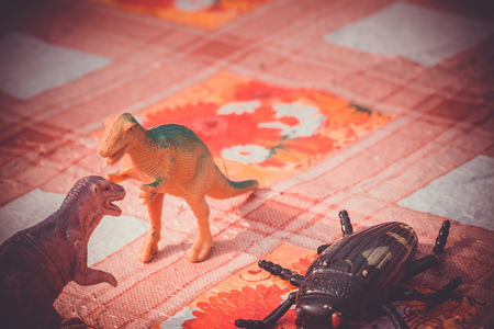 Plastic toys of prehistoric animals, dinosaur on the table.の写真素材