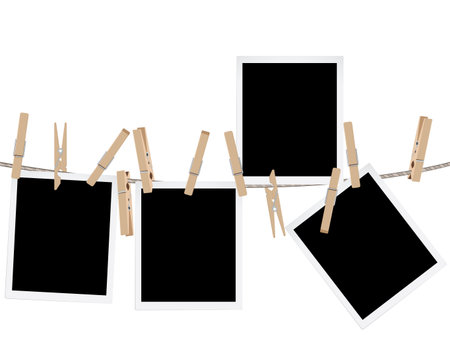 Retro photo frames hung on a rope with wooden clothespins.のイラスト素材