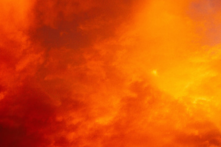 Summer sunset sky with clouds of red color.の写真素材