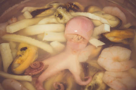 Tasty and healthy salad with pickled seafood and soy sauce.の写真素材