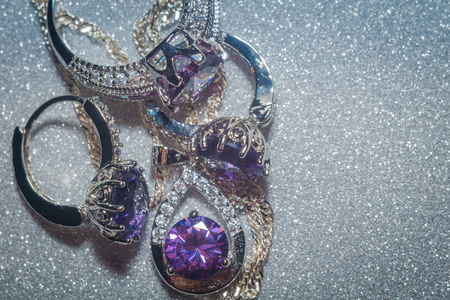 Fashion silver pendant with purple zirconia, amethyst imitation.の写真素材