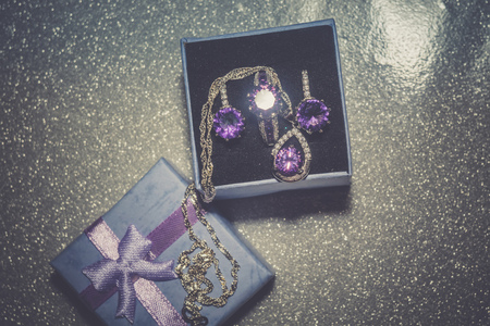 Fashion silver ring with purple zirconia, amethyst imitation, filtered.の写真素材