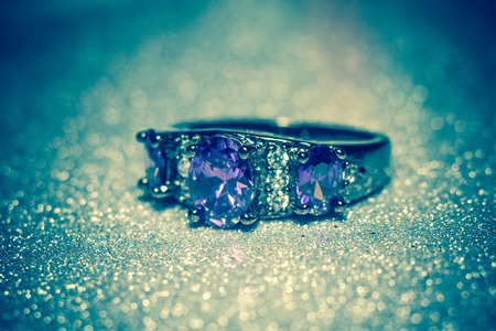 Fashion silver ring with purple zirconia, amethyst imitation, filtered.の写真素材