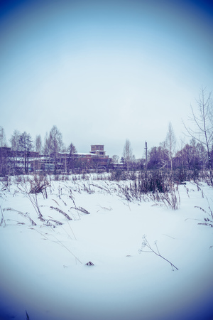 Vintage style red brick old factory, filtered winter time landscape.のeditorial素材