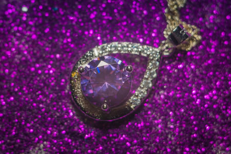 Fashion silver pendant with purple zirconia, amethyst imitation.の写真素材