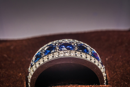 Fashion silver ring with blue purple tanzanite gem.の写真素材