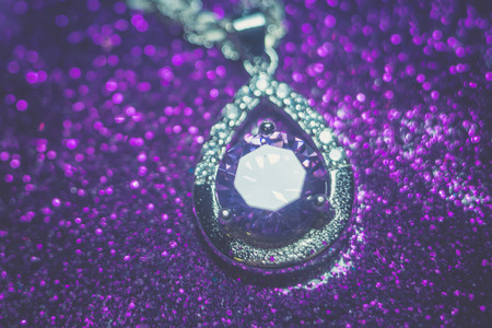 Fashion silver pendant with purple zirconia, amethyst imitation, filtered.の写真素材